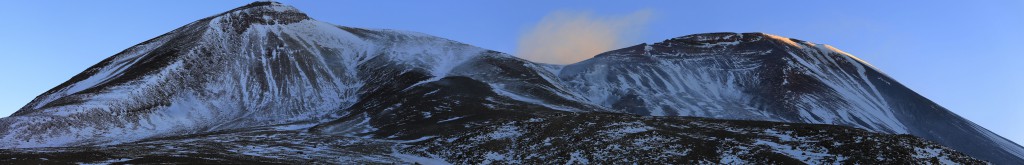 As we're approaching Lascar, the sun grazes the peak to the right and illuminates the volcanic ash plume emanating from the crater. 5 hours later, we're standing on top!